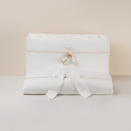 Ensemble couette et pare-chocs pour berceau à bascule