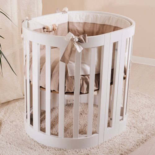 Oval cradle with conversion kit into a cot and armchairs